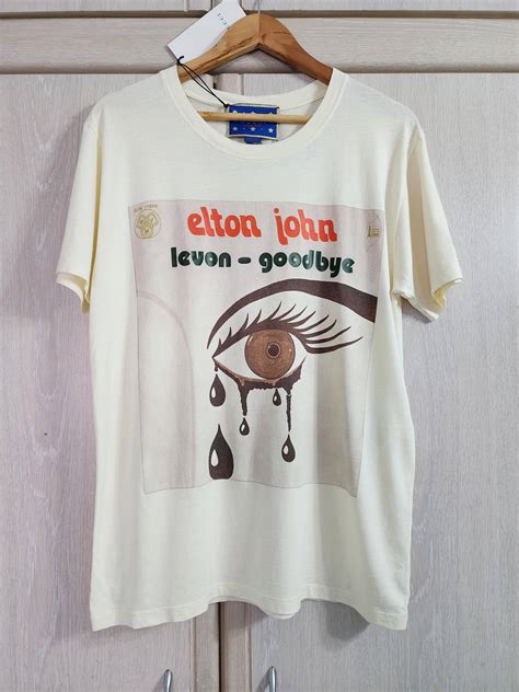 elton john levon gucci shirt|T.